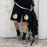 Shorts mit Gänseblümchen-Stickerei